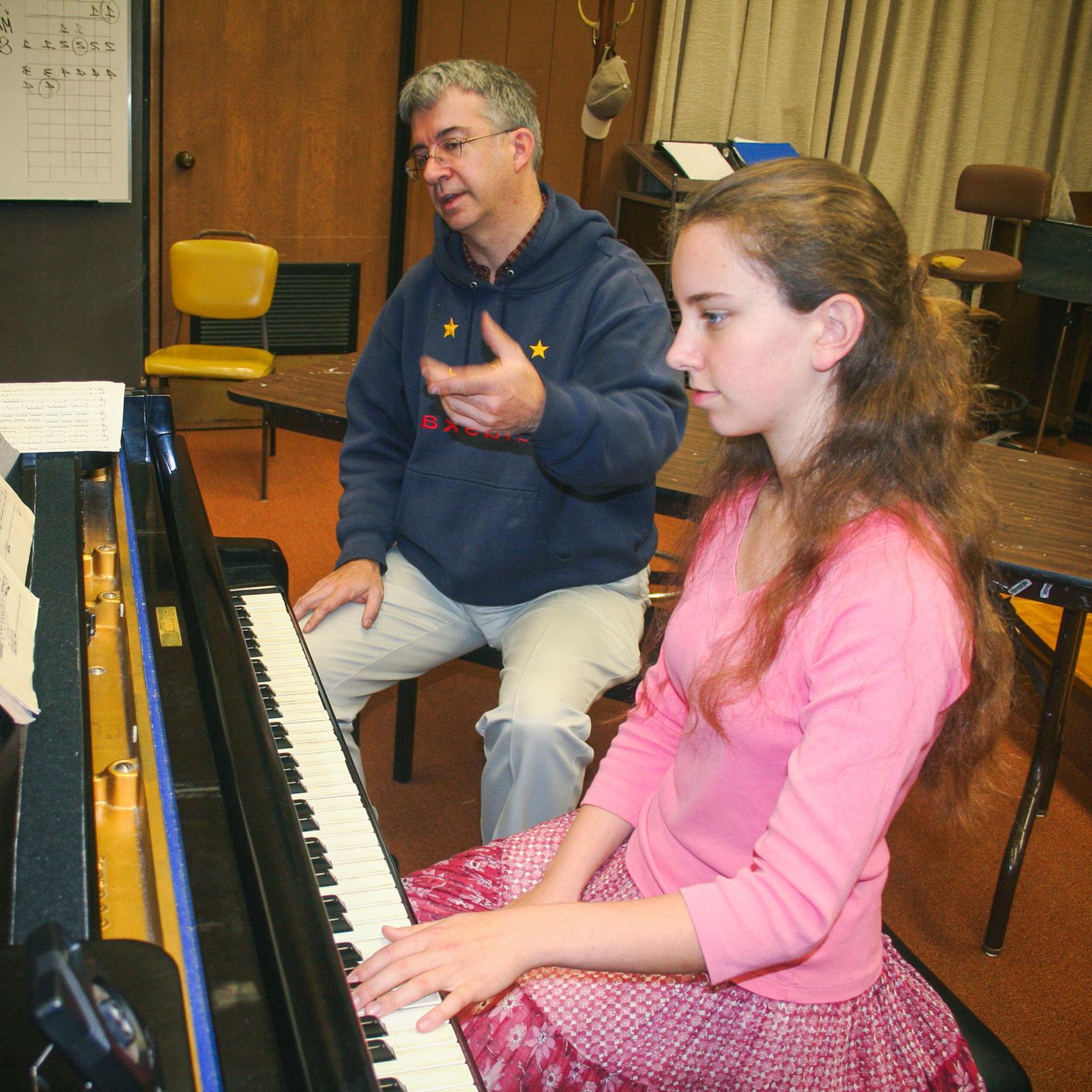 Student receiving instruction on the Grieg Opus 7 piano sonata